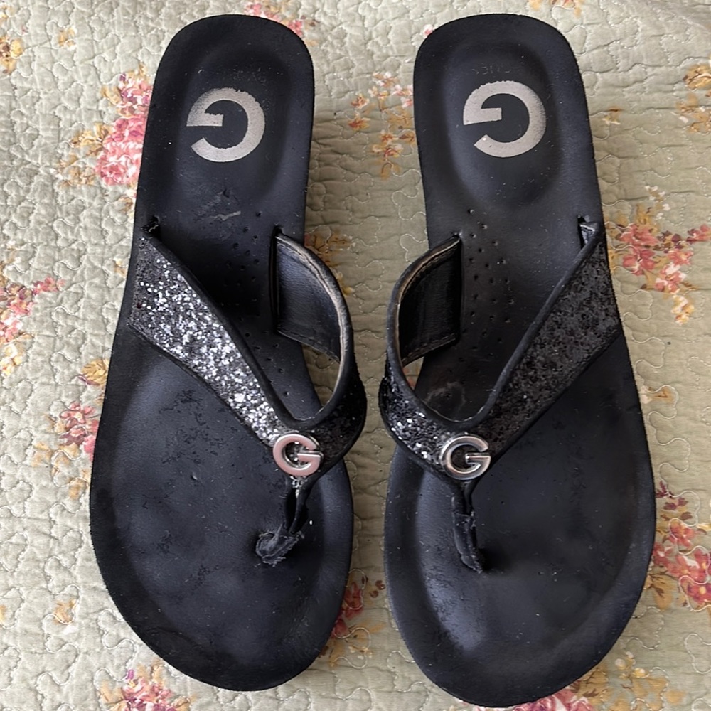 Guess black platform blingy flip flops. Size 10